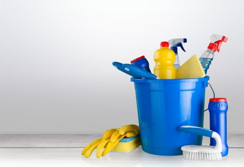 Staff member using PPE during cleaning