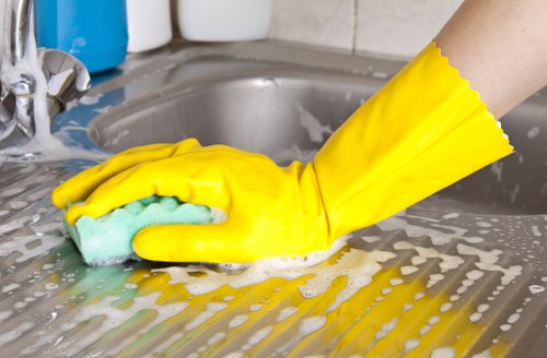 Deep kitchen cleaning during a move-out service in Utton